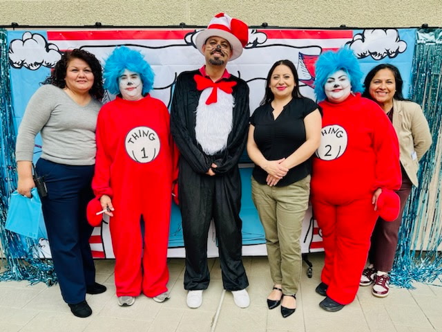Denise at a Dr. Seuss themed school literacy event