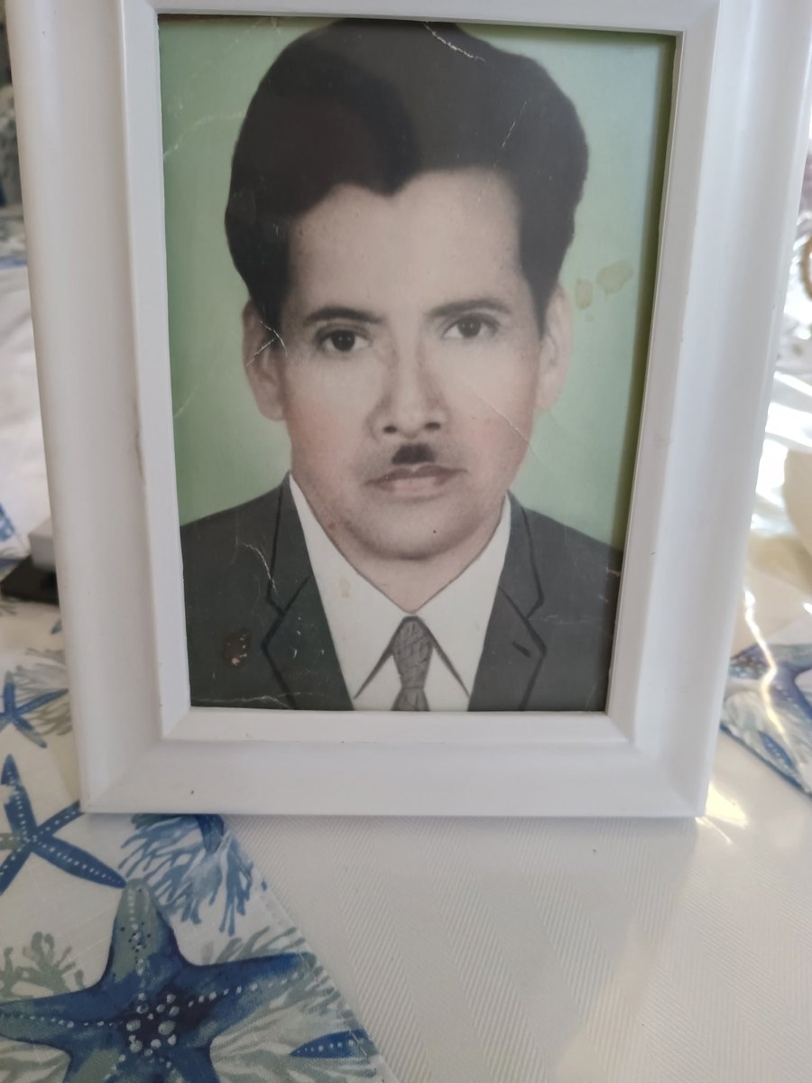 A cherished portrait of Denise's grandfather